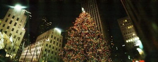 Christmas tree lit up at night Rockefeller Center Manhattan New York City New York State USA Canvas Art - Panoramic Images (30 x 12)
