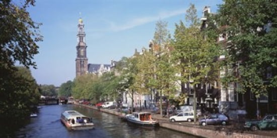 Church along a channel in Amsterdam Netherlands Canvas Art - Panoramic Images (24 x 12)