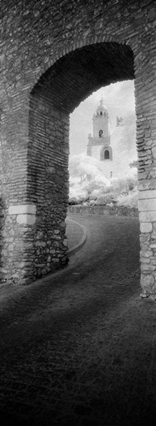 Church viewed through an archway Puerta Del Sol Medina Sidonia Cadiz Andalusia Spain Canvas Art - Panoramic Images (36 x 13)