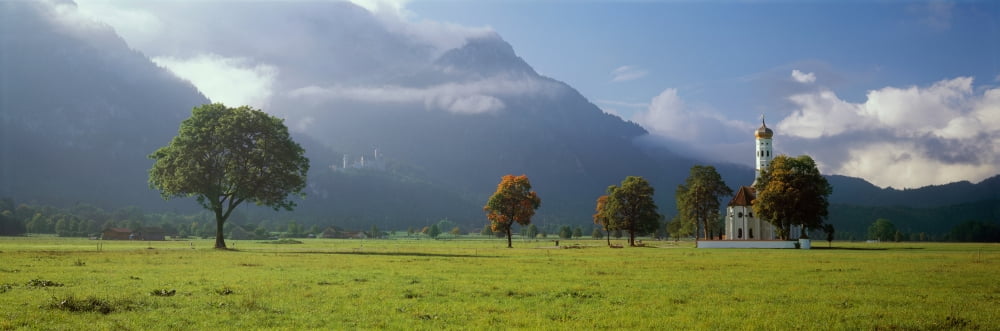 Church with a castle in the background St Coloman Church Neuschwanstein Castle Fussen Allgau Bavaria Germany Canvas Art - Panoramic Images (36 x 12)