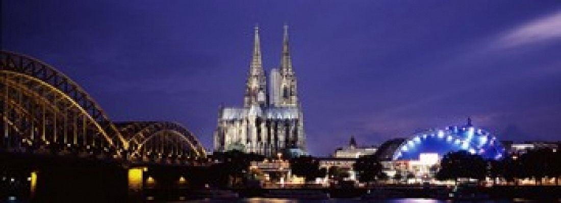 City at dusk Musical Dome Cologne Cathedral Hohenzollern Bridge Rhine River Cologne North Rhine Westphalia Germany Canvas Art - Panoramic Images (18 x 7)