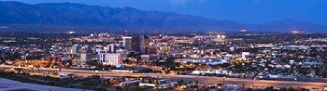 City lit up at dusk Tucson Pima County Arizona USA 2010 Canvas Art - Panoramic Images (20 x 6)