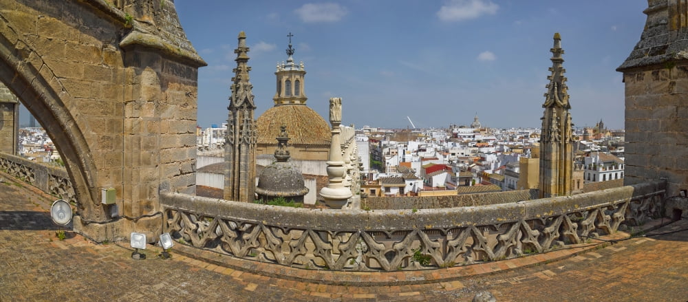 City view from a cathedral roof Seville Cathedral Seville Andalusia Spain Canvas Art - Panoramic Images (36 x 12)