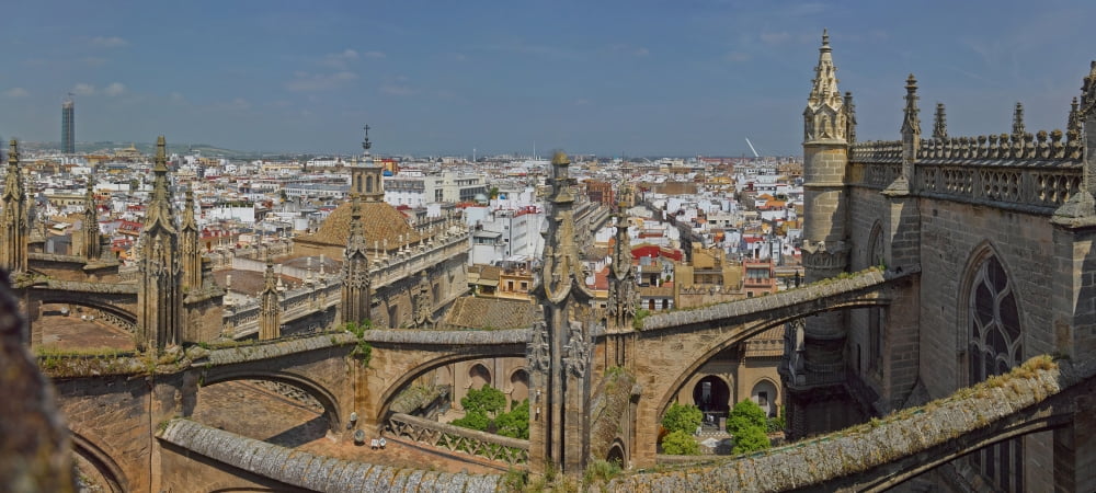 City view from a cathedral roof Seville Cathedral Seville Andalusia Spain Canvas Art - Panoramic Images (36 x 12)