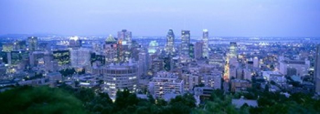 Cityscape at dusk Montreal Quebec Canada Canvas Art - Panoramic Images (18 x 7)