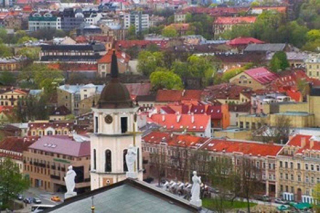 Cityscape dominated by Cathedral Bell Tower Vilnius Lithuania Canvas Art - Keren Su DanitaDelimont (34 x 23)