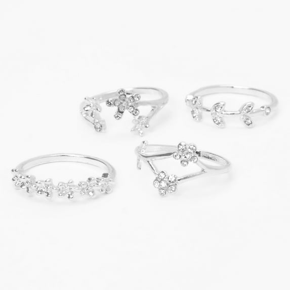 Claire's 4 Piece Silver Rings Set Fits Size Small/Medium Flowers and Stars Female,Teen