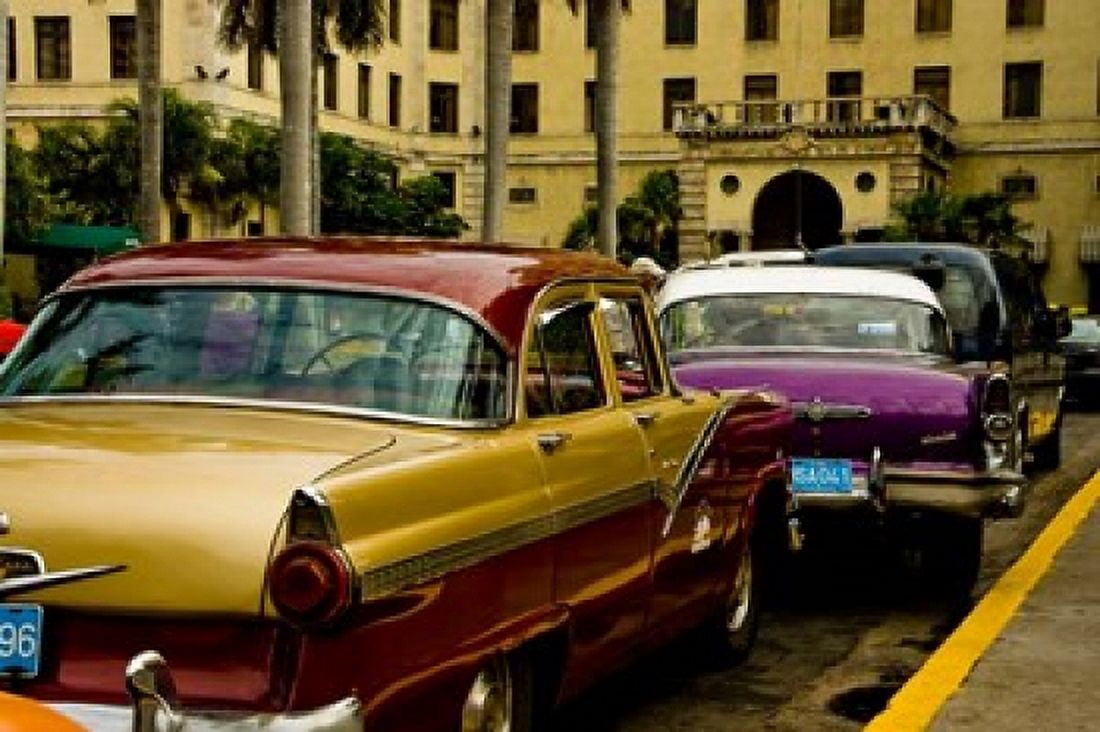 Classic American cars streets of Havana Cuba Canvas Art - Jerry Ginsberg DanitaDelimont (35 x 24)