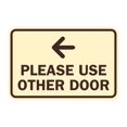 thumbnail image 1 of Classic Framed Please Use Other Door Left Arrow Sign (Ivory/Dark Brown) - Medium, 1 of 1