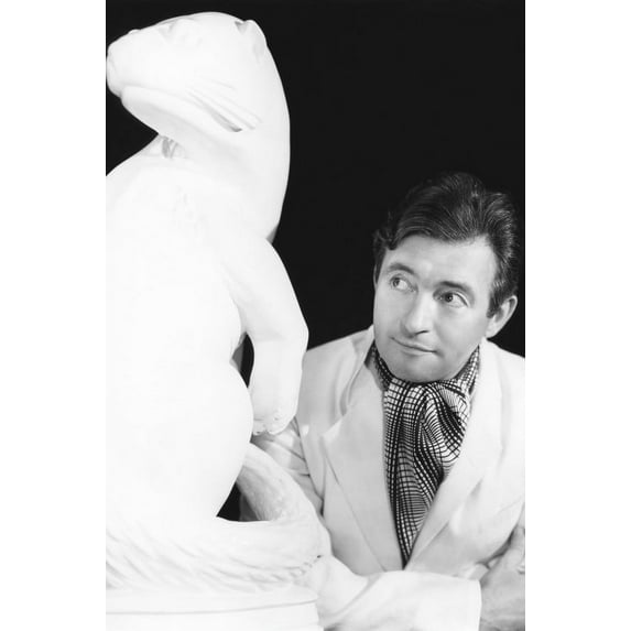 Claude Rains glancing at statue wearing light color jacket 24x36 Poster