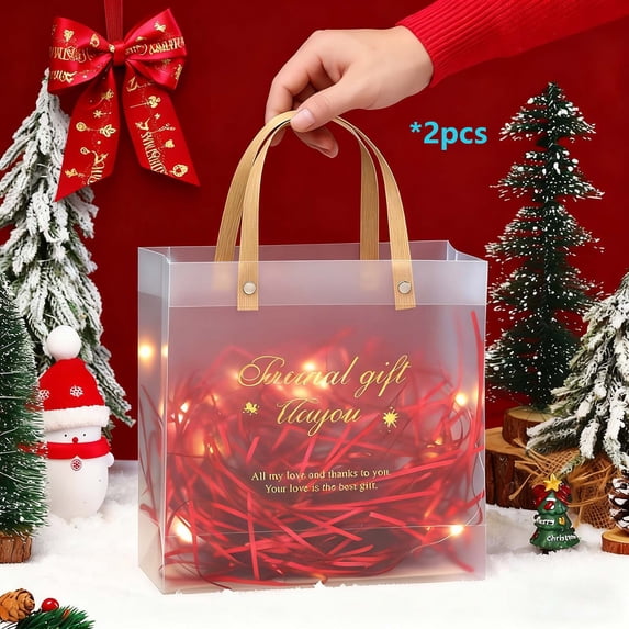 Clear Christmas Gift Bags with Handles, 2-Pack Plastic Treat Bags for Candy, Apples, Party Favors, Gold Bows