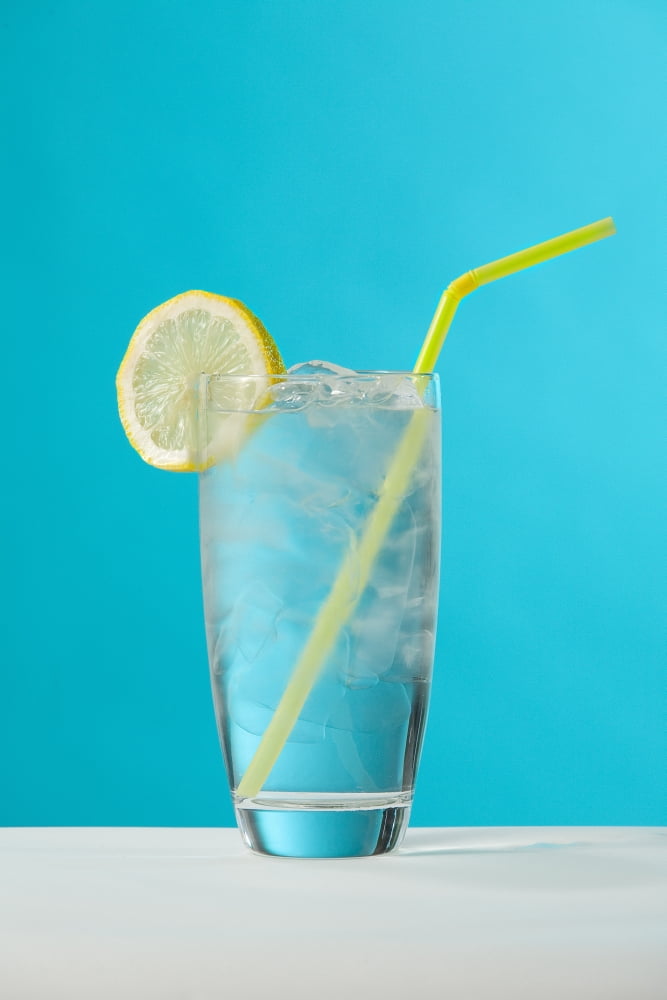 Clear Glass Of Water With Lemon And Drinking Straw Canvas Art - Greg Huszar Photography Design Pics (22 x 34)