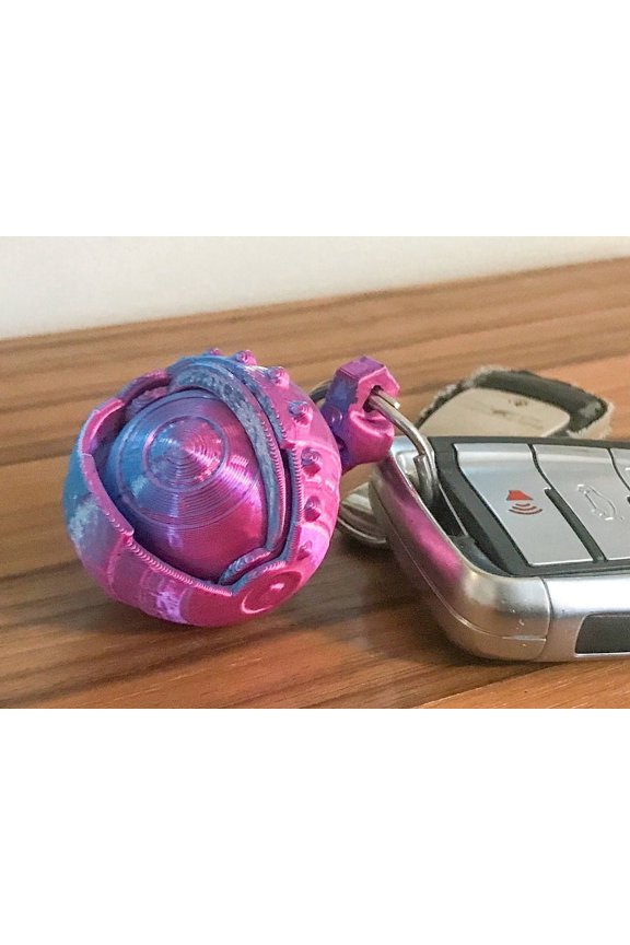 Moving Eye Fidget Keychain – Pocket-Sized Stress with Open/Close Lid