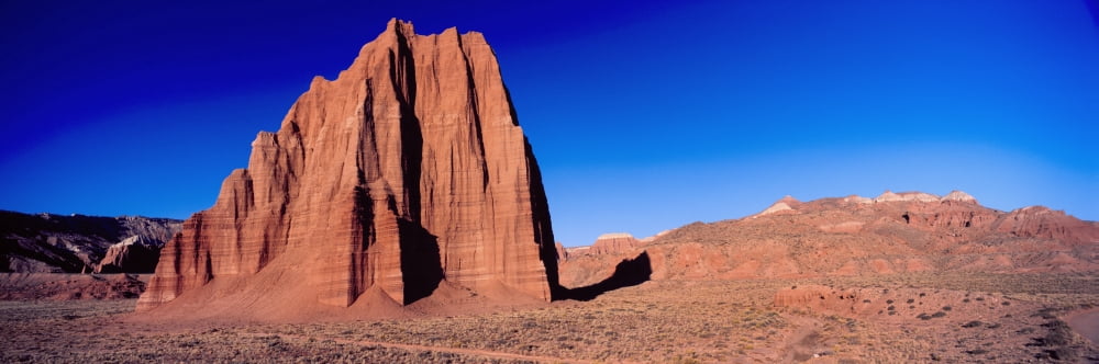 Cliff in Capitol Reef National Park against blue sky Utah USA Canvas Art - Panoramic Images (36 x 12)