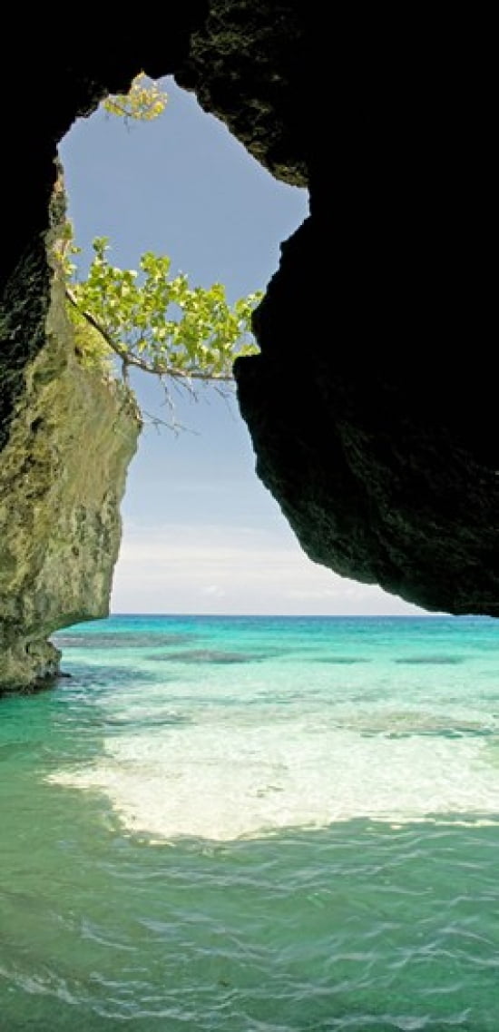 Cliffside cave at Xtabi Hotel Negril Westmoreland Jamaica Canvas Art - Panoramic Images (24 x 12)