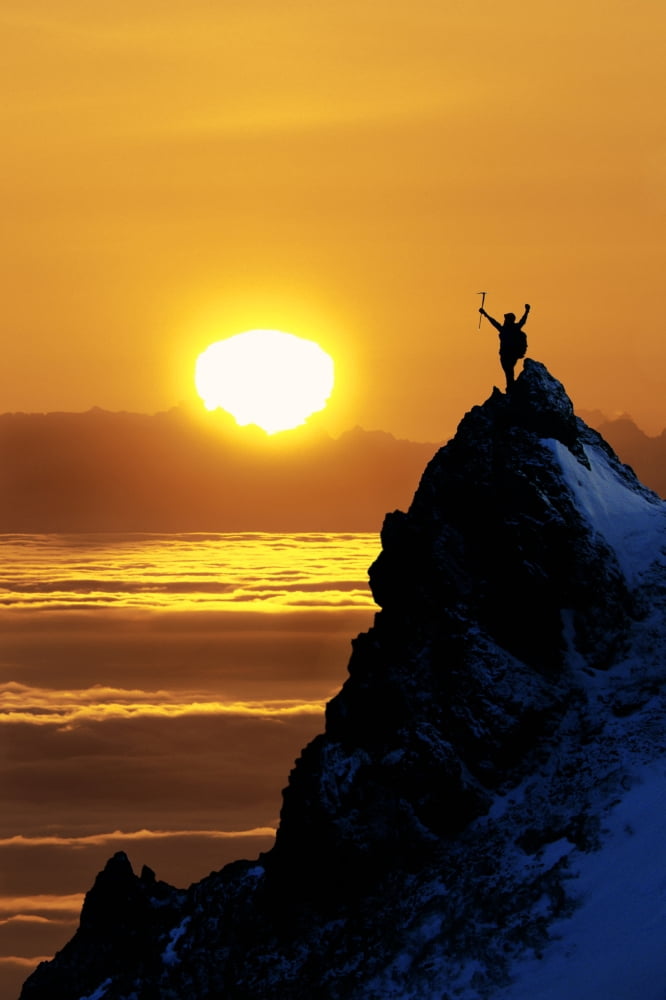 Climber Standing Atop Peak At Sunset Ak Composite Canvas Art - Michael DeYoung Design Pics (12 x 19)
