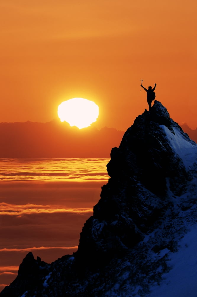 Climber Standing Atop Peak At Sunset Ak Composite Canvas Art - Michael DeYoung Design Pics (24 x 38)