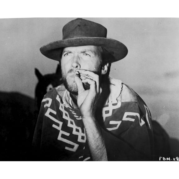 Clint Eastwood Holding Tobacco in Classic Photo Print (8 x 10)