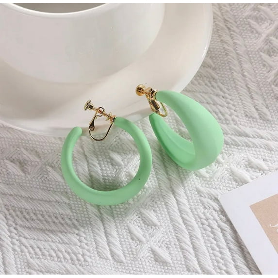 Clip on 1 1/2" gold multi colored open back hoop earrings in a variety of colors