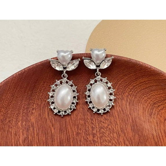 Clip on 1 1/2" silver & white heart pearl earrings w/clear stones
