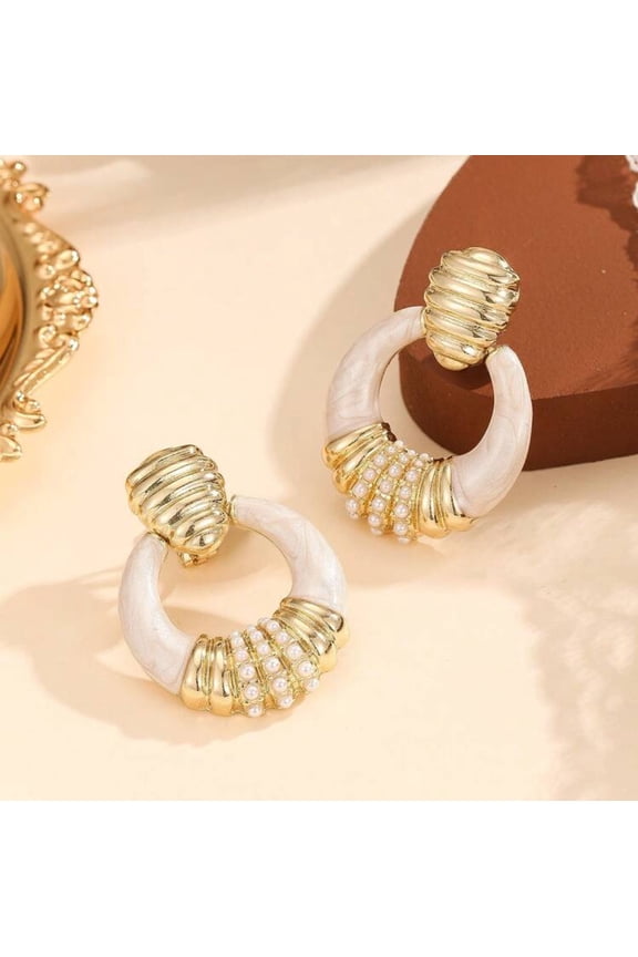 Clip on 1 3/4" indented gold and white stone hoop with white pearls