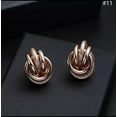thumbnail image 1 of Clip on 1" shiny and textured rose three row knot earrings, 1 of 4