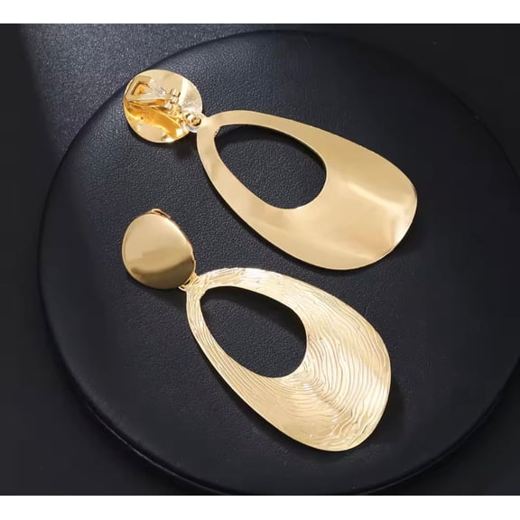 Clip on 2 3/4" lightweight shiny gold bent textured dangle earrings