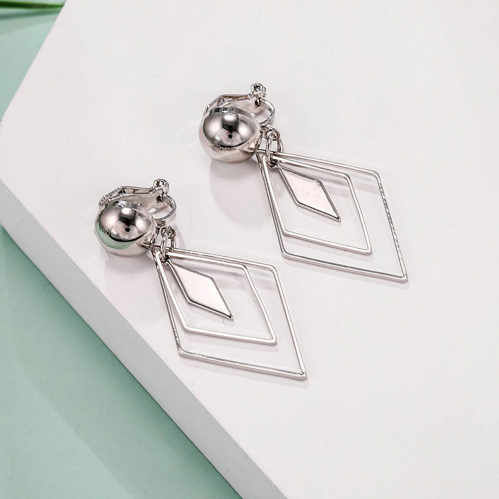 Clip on 2" lightweight silver layered pointed dangle earrings