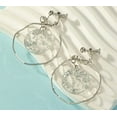 thumbnail image 1 of Clip on 2" silver wavy hoop earrings w/center silver glitter circle, 1 of 4