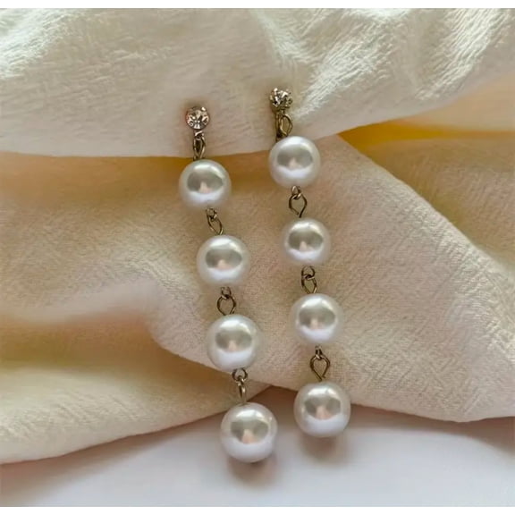 Clip on 3" long silver clear stone and dangle four white pearl earrings