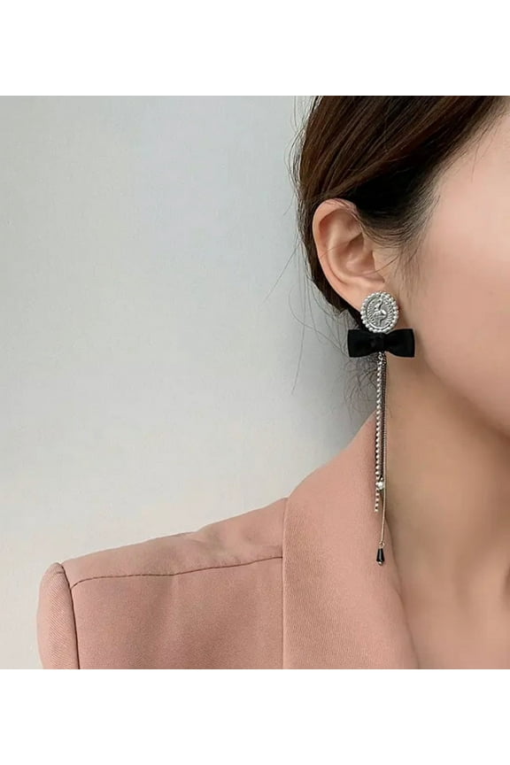 Clip on 5" silver dancing lady black bow earrings with dangle chain and white pearl