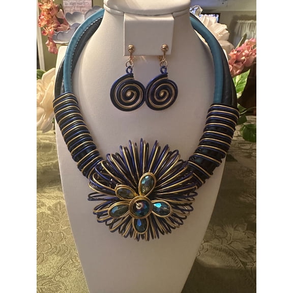 Clip on gold, blue multi colored wire flower necklace and earring set