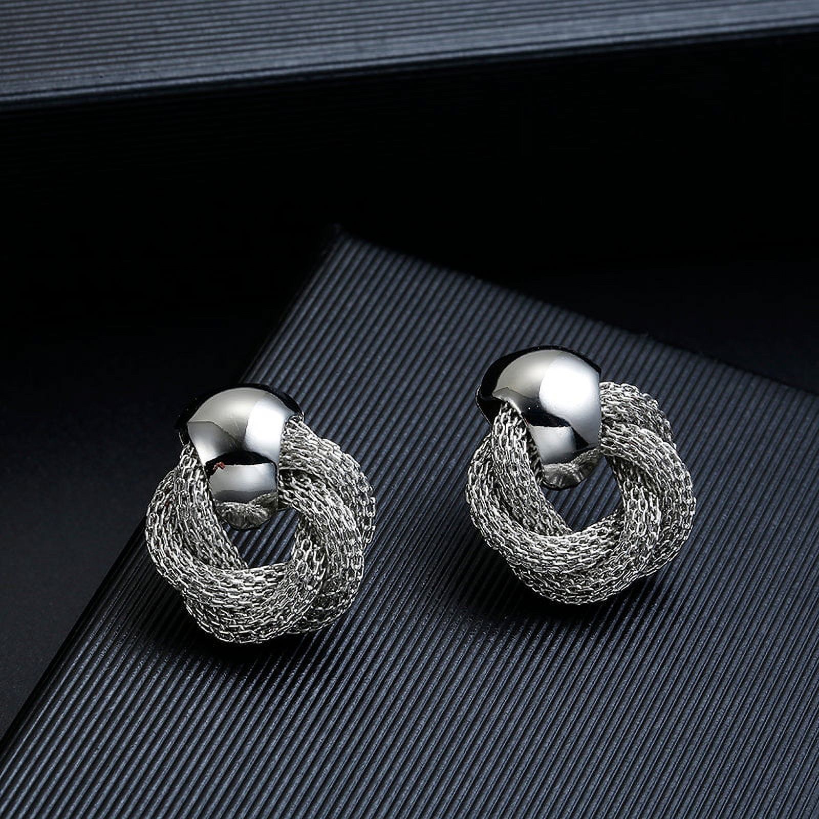 Clip on silver twisted door knob style open earrings