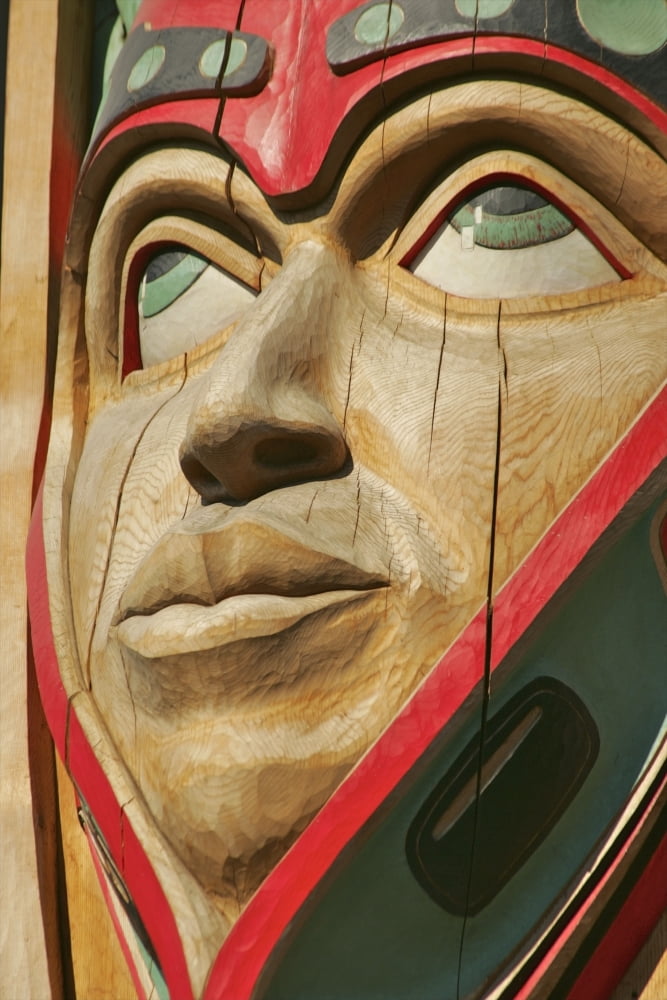 Close Up Of A Face On A Traditional Haida Totem Carving In Ketchikan Alaska Canvas Art - Clark Mishler Design Pics (22 x 34)