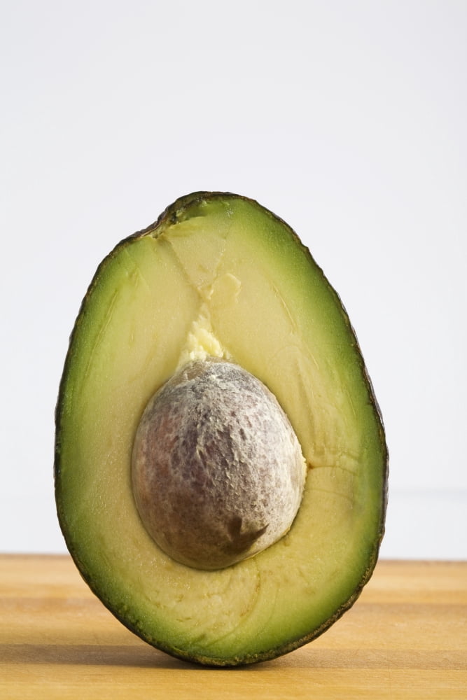 Close Up Of An Avocado Standing Upright Cut In Half With The Pit Calgary Alberta Canada Canvas Art - Michael Interisano Design Pics (24 x 38)