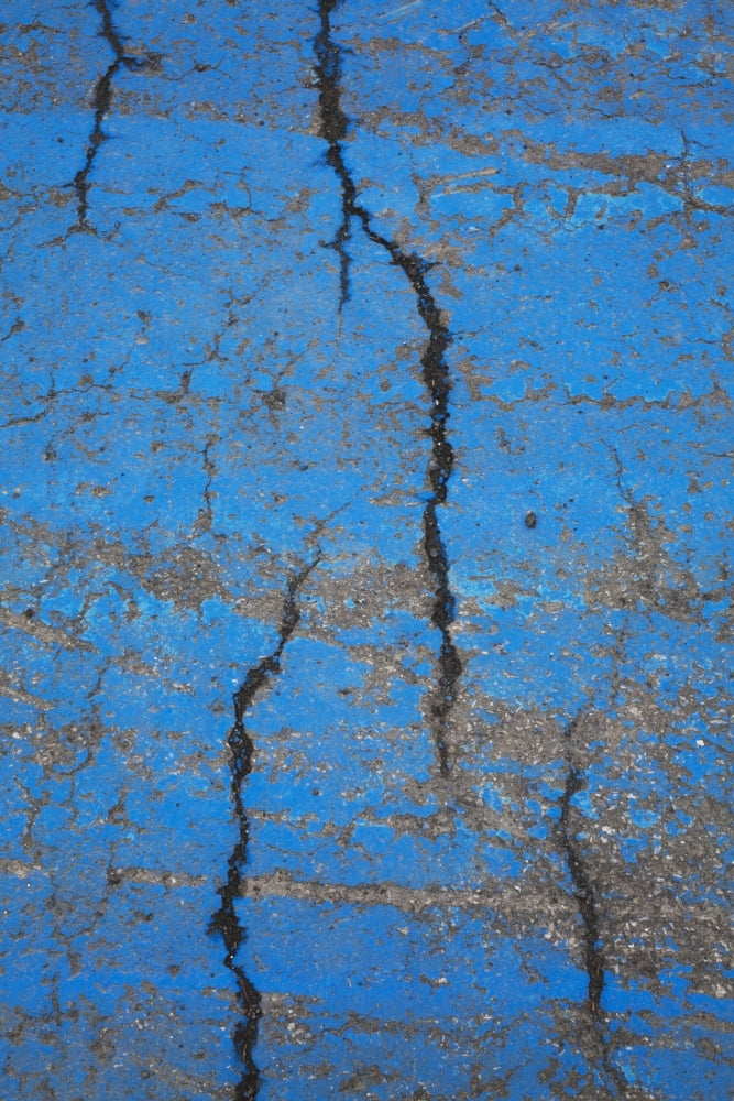 Close Up Of Cracks On A Blue Painted Asphalt Surface Montreal Quebec Canada Canvas Art - Perry Mastrovito Design Pics (12 x 18)