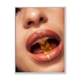 thumbnail image 1 of Close Up VIew of Female Lips Biting Gummy Bear 16 in x 32 in Framed Painting Canvas Art Print, by Designart, 1 of 5