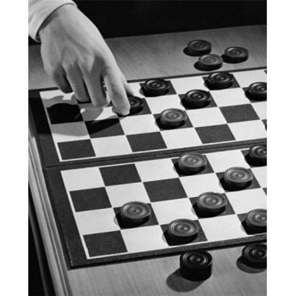 Close-Up of a Persons Hand Playing Checkers Poster Print - 18 x 24 in.
