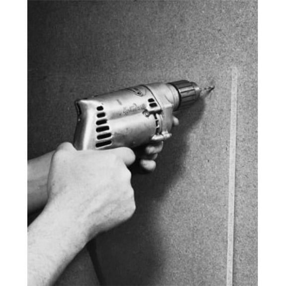 Close-Up of a Persons Hands Drilling Into a Wall Poster Print - 18 x 24 in.