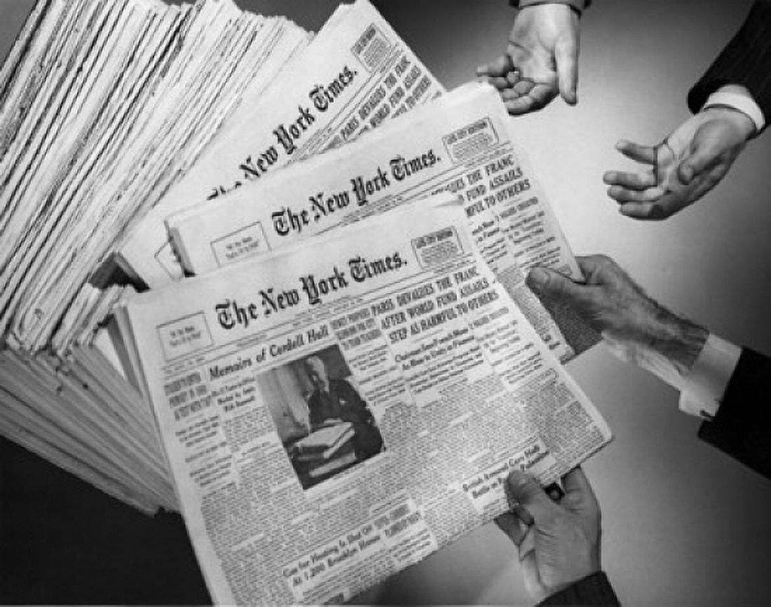 Close-up human hands holding newspapers Canvas Art - (18 x 24)