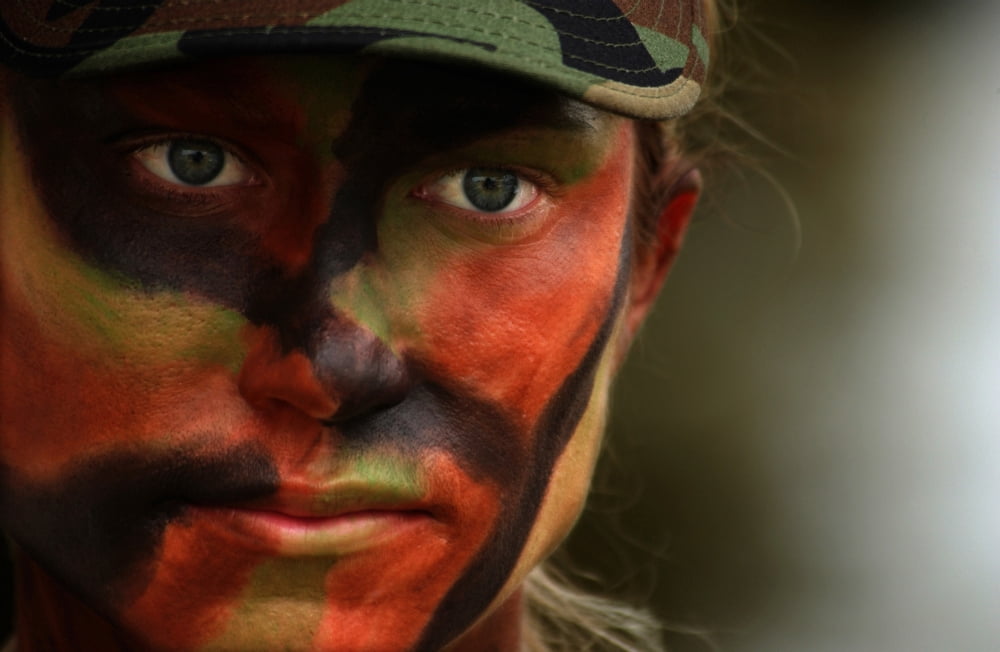 Close-up of US Air Force soldier with camouflage face paint Canvas Art - Stocktrek Images (35 x 23)