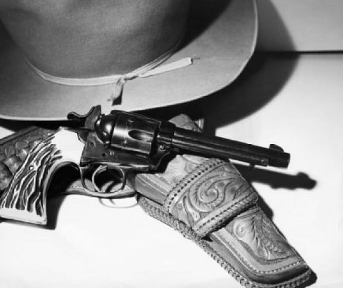 Close-up of a 38 Caliber Bisley Special Colt Revolver and a hat Canvas Art - (24 x 36)