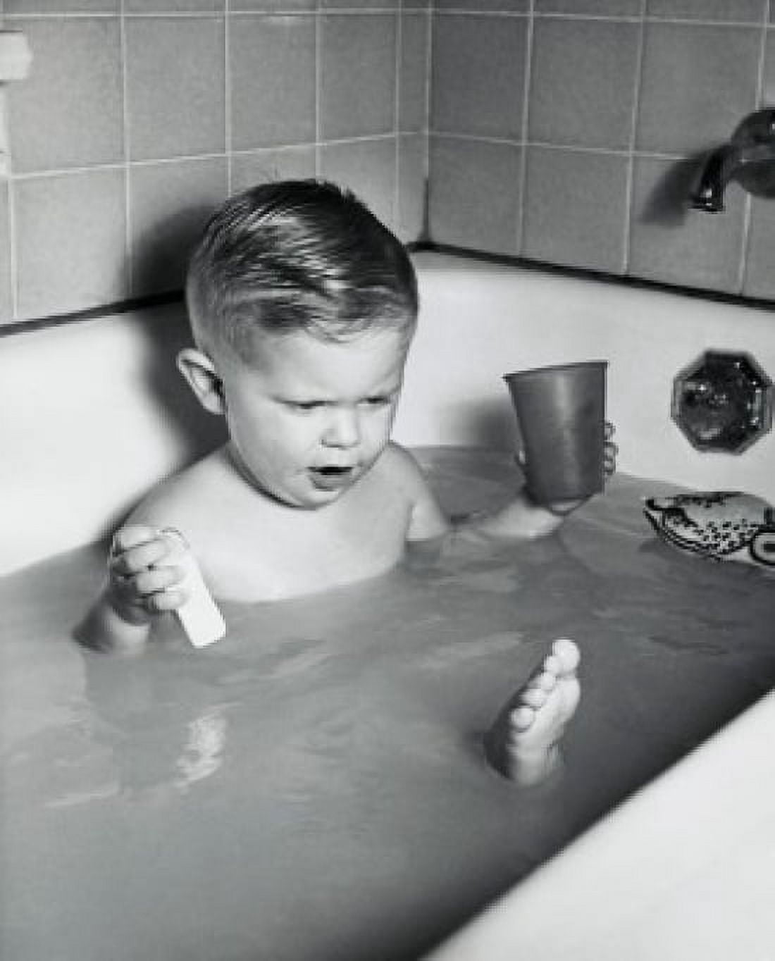 Close-up of a baby boy playing in a bathtub Canvas Art - (18 x 24)
