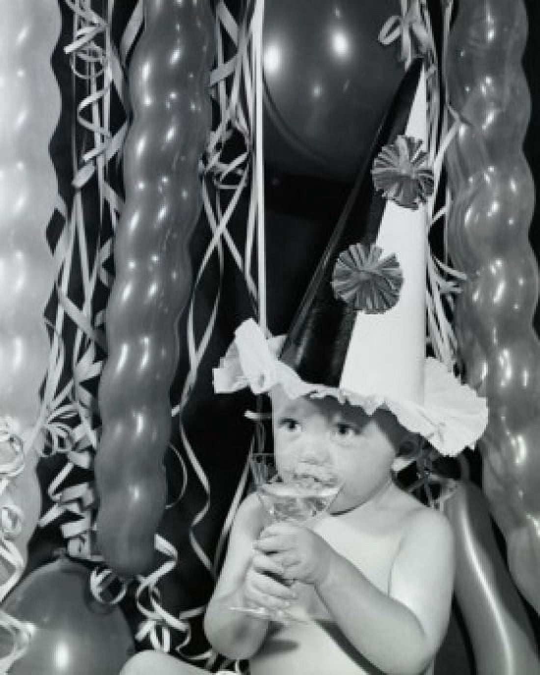 Close-up of a baby boy sipping champagne from a glass Canvas Art - (24 x 36)