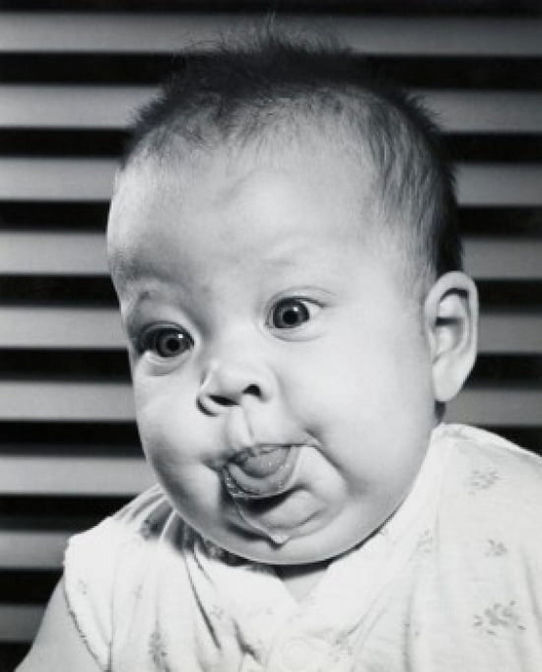 Close-up of a baby boy sticking his tongue out Canvas Art - (24 x 36)