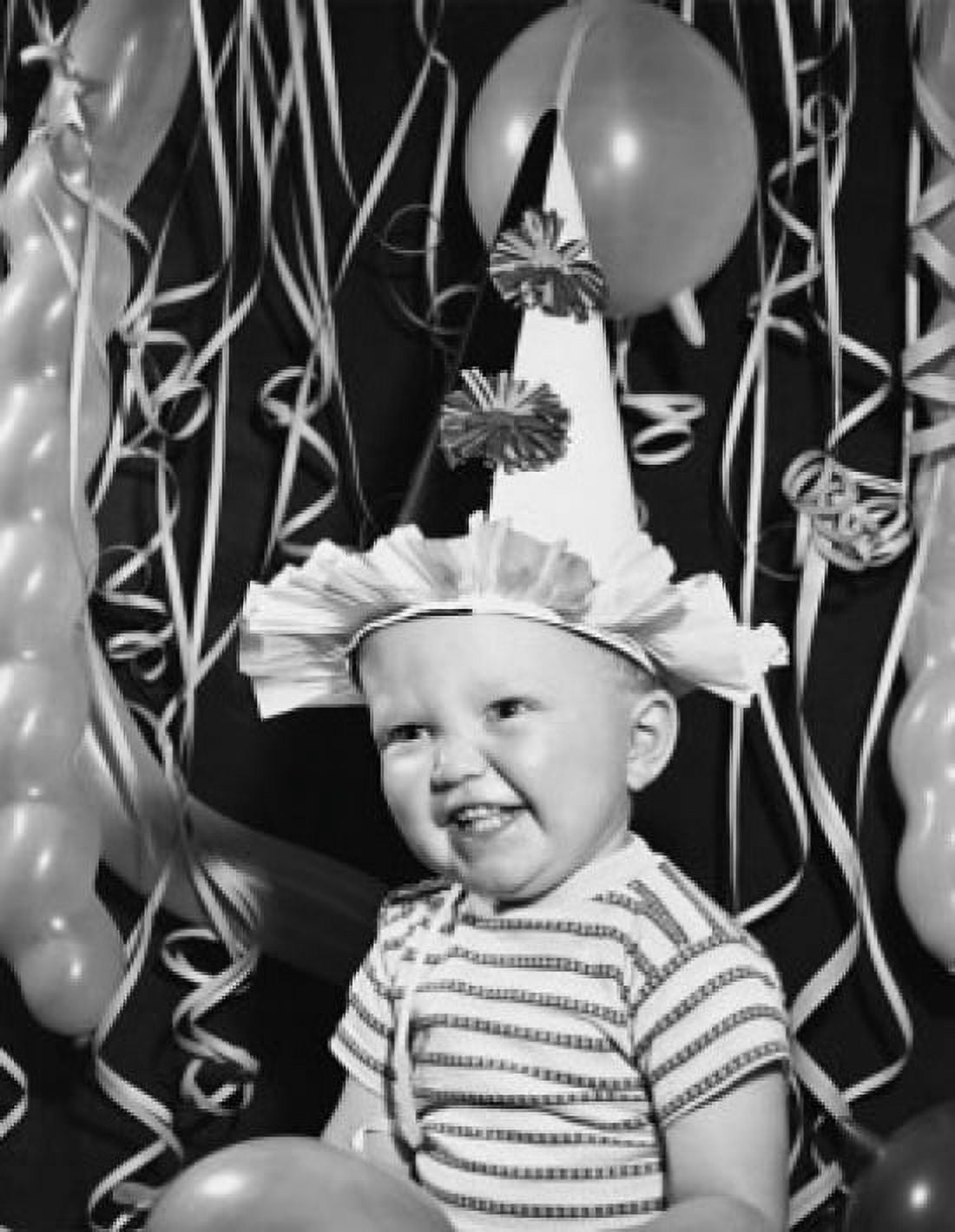 Close-up of a baby boy wearing a party hat and smiling Canvas Art - (24 x 36)