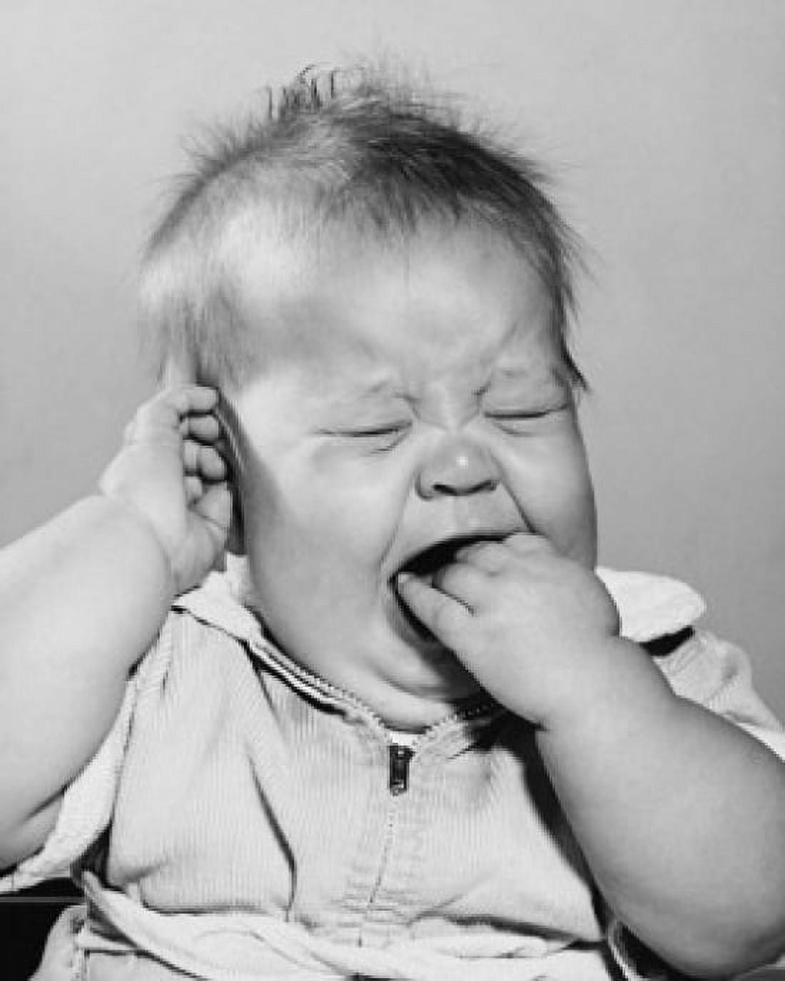 Close-up of a baby crying with its fingers in its mouth Canvas Art - (24 x 36)