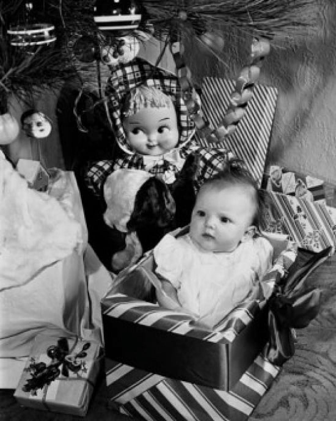 Close-up of a baby girl sitting in a gift box Canvas Art - (24 x 36)