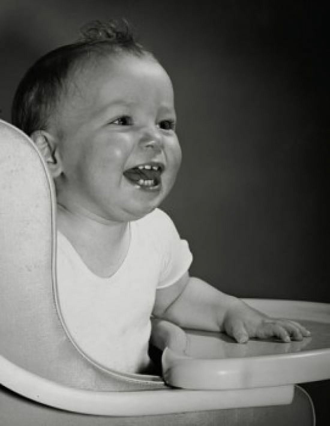 Close-up of a baby laughing in a high chair Canvas Art - (24 x 36)