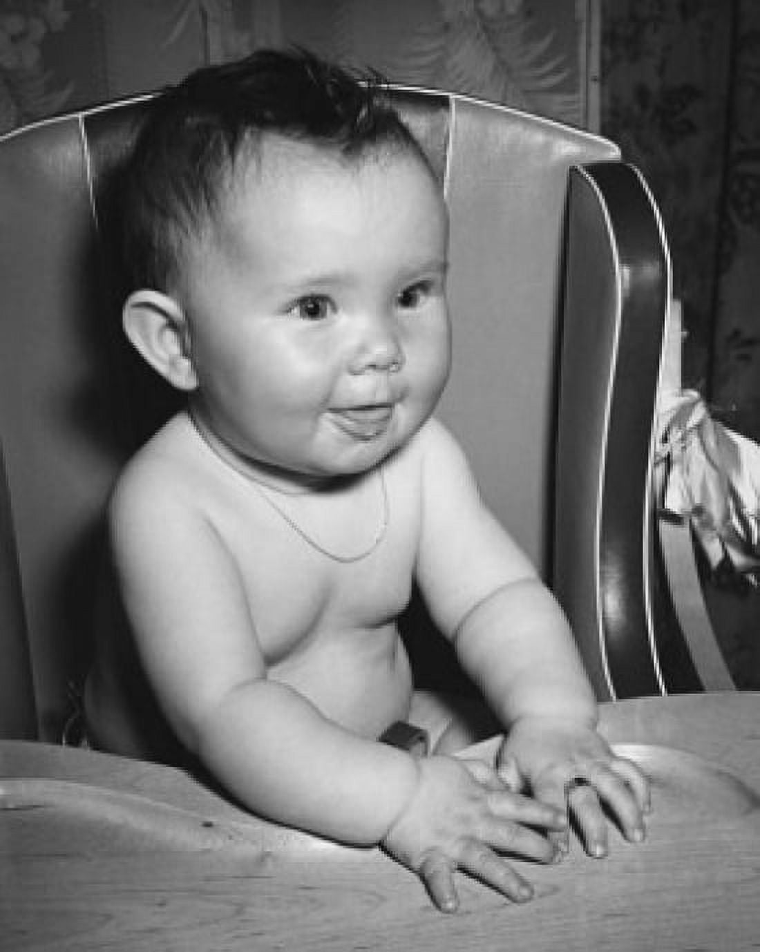 Close-up of a baby sitting in a high chair Canvas Art - (18 x 24)